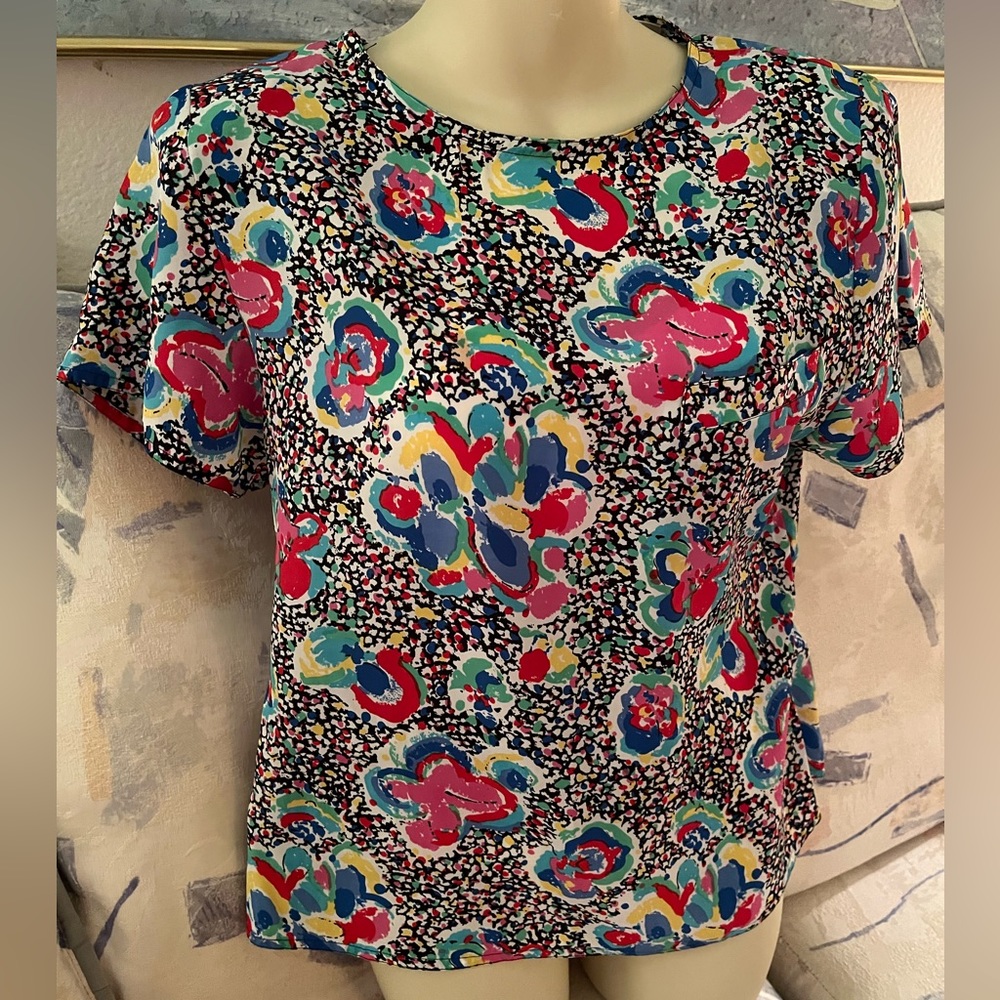 Like New polyester (silky feel) summer blouse.
